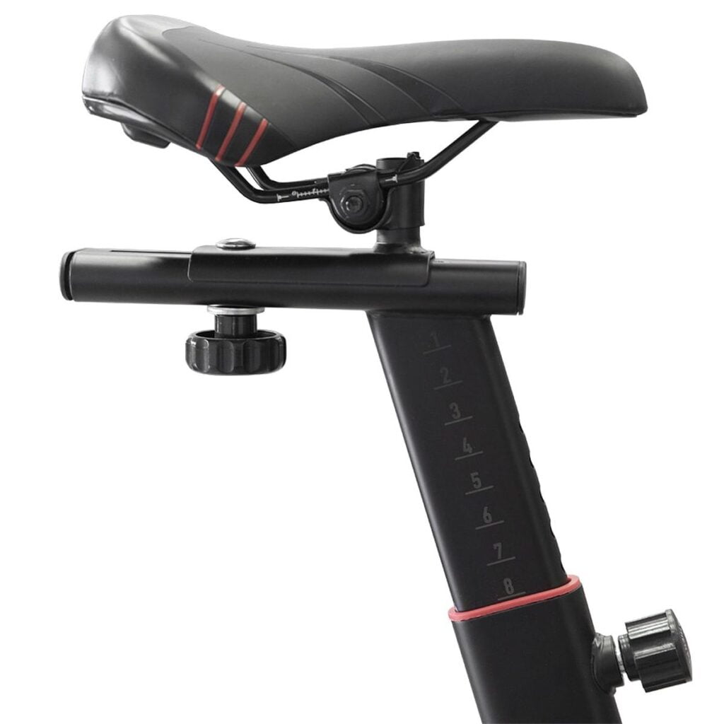 Close-up of a black bicycle seat mounted on an adjustable seat post with measurement markings, highlighting the seat adjustment mechanism.